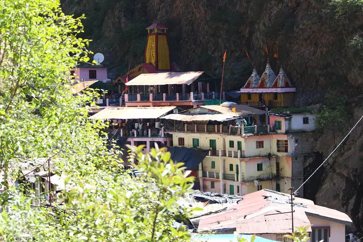 Yamunotri shrine and ashram buildings in the hills where the Yamuna river begins